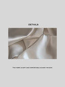 Off-White Rayon Halterneck Backless Asymmetric Drape Longline Top